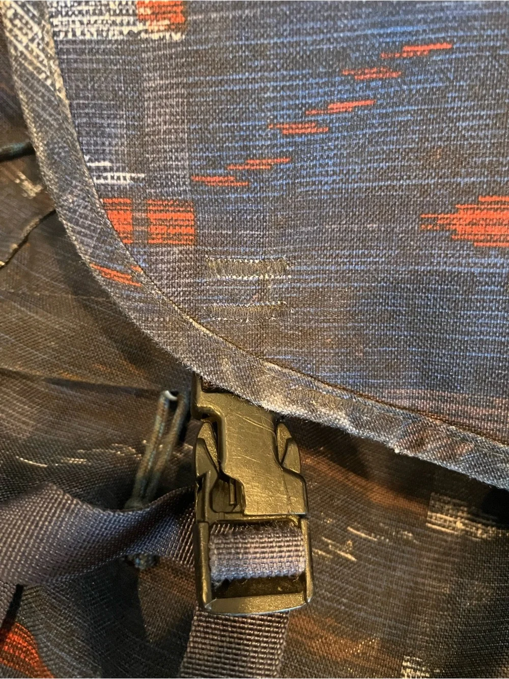 Patagonia Navy Blue Patterned Daypack with Rust Accents.  25L